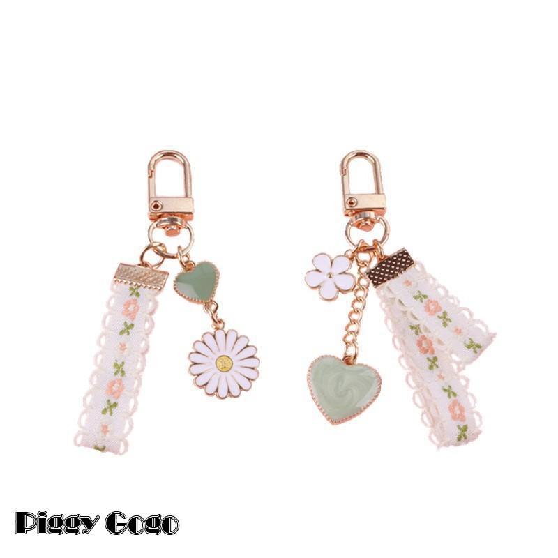 キーホルダー ストラップ レディース フラワー 花 リボン ハート チロリアンテープ かわいい おしゃれ バッグチャーム 根付け